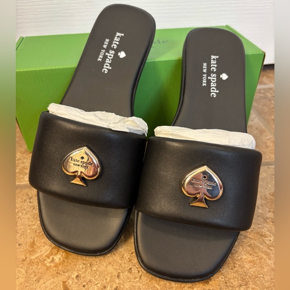 kate spade Shoes - NIB Ladies Kate Spade Kendall Black Slides with Gold Logo Size 7